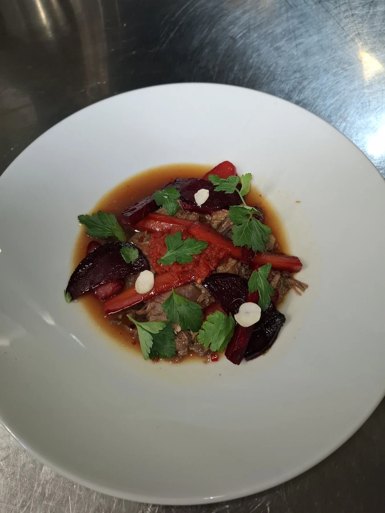 Lamb, beetroot, carrot, parsley, crushed tomato, onion jus.