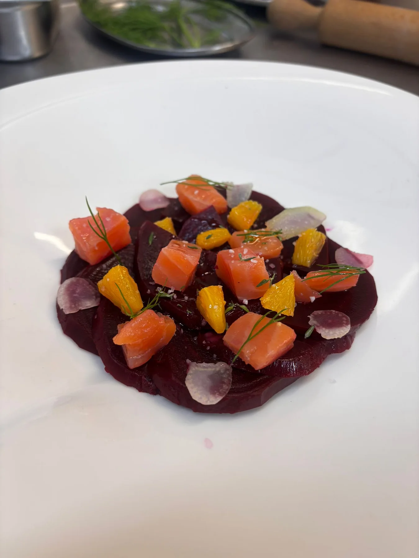 Cooked beetroot, grape and mustard dressing, salmon gravlax, orange, fennel, olive oil.